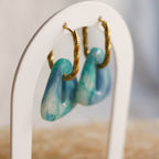 Créoles en acier inoxydable - ovales torsadées - Bar à boucles