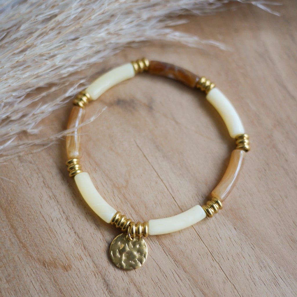 Bracelet La Boca personnalisable en perles tubes incurvées et acier inoxydable, modèle élastique disponible en plusieurs coloris.