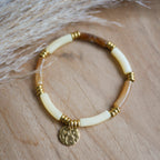 Bracelet La Boca personnalisable en perles tubes incurvées et acier inoxydable, modèle élastique disponible en plusieurs coloris.