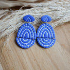 Boucles d'oreilles Tunis faites main en pâte polymère avec motifs graphiques en relief et attaches en acier inoxydable.